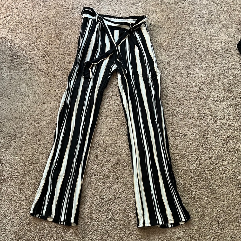 Long black pants. Size small. Worn once.